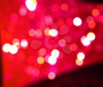 Bright pink background with bokeh light effect.