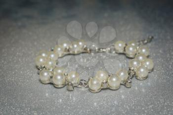 Decorative fashion bracelet made of fake pearls, imitation.
