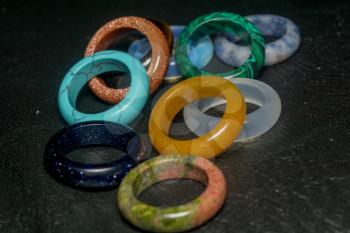 Collection of ring made of different stones, natural stone jewellery.