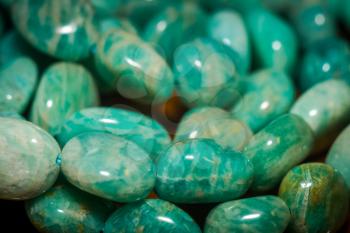 Natural amazonite stone beads in an irregular shape, green and white colors.