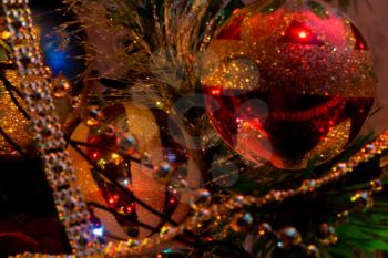 Decorated Christmas tree and colorful garland lights.