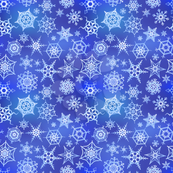 A lot of frozen snowflakes on blue winter background, seamless pattern