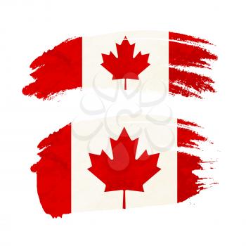 Grunge brush stroke with Canada national flag isolated on white