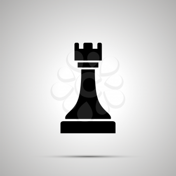 Simple black Rook chess icon with with shadow on gray