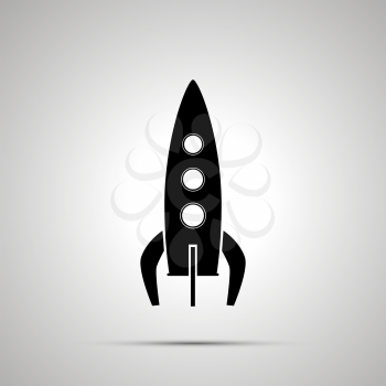 Spaceship silhouette, simple black icon with shadow