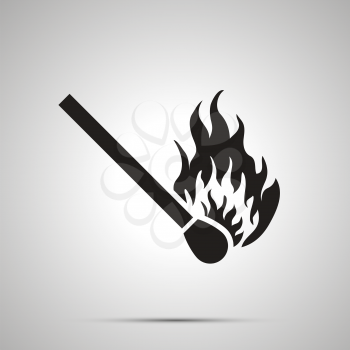 Match with fire icon, simple black silhouette on gray