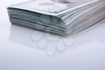American 100 dollar banknotes on a white background