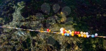 Balloons in shooting range as targets on water