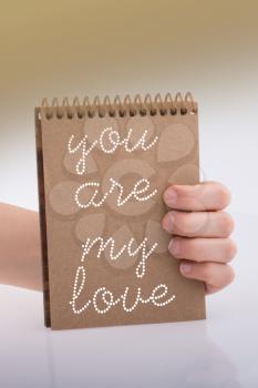 You are my love text  in hand  over white background