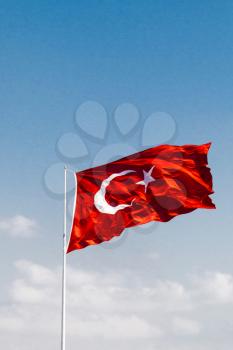 Turkish national flag with white star and moon on red background