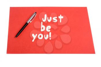 Just be you text with Pen and plain paper as motivational concept