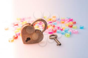 Metal padlock in heart shape as  symbol of love