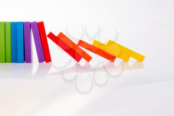 Multi color dominoes on a white background