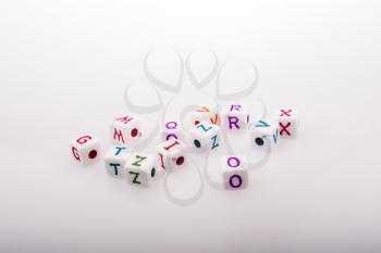 Colorful alphabet letter cubes on a white background