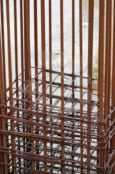 Rusty metal reinforcement bars mesh at construction site.