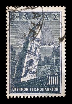 GREECE - CIRCA 1953. Vintage social welfare stamp for the earthquake victims of 12th August 1953 which caused widespread damage throughout the islands of Kefalonia and Zakynthos, with burning city and church steeple ruins illustration, circa 1953.