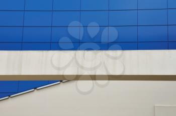 Glass building facade detail abstract architecture background.