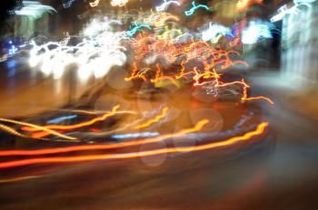 Speeding cars on the motorway city traffic at night. Motion blur.