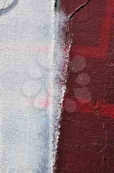 White paint smudged over textured wall. Abstract background.