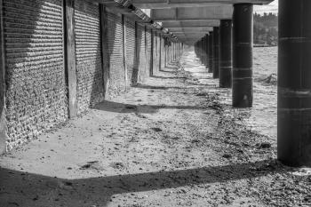 A view of a walkway that is under constrtuction at Redondo Beach, Washington. Black and white image.