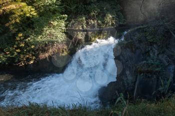 Water rushes down at lower Tumwater Falls in Washington State.