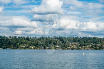 Clouds hover over Mercer Island, Washington. Shot taken from Seward Park.