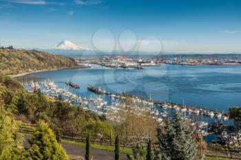 A panoramic view of Mount Rainier, The Port of Tacoma and a marina.