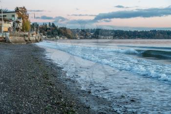 A seawall is oncovered at low tide at Three Tree Point in Burien, Washington.