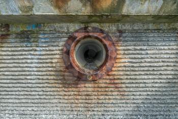 A view of a sewer outlet in a wall at Redondo Beach, Washington.