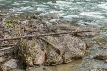 Rocks line the shore on the Snoqualmie River in Washington State.