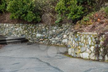 A view of a stone wall at Lincoln Park in West Seattle, Washington.