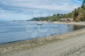 A view of the shoreline in West Seattle, Washington near Lincoln Park.