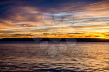 A veiw of wispy clouds at sunset over the Puget Sound.