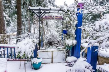 A view of a front porch that is covered with snow in Burien, Washington.