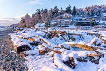 A view of snow along the shore in Normandy Park, Washington.