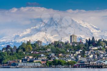 Mount Rainers seems to be right on top of a neighborhood in Tacoma, Washington.
