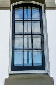 A view of a tall double window.