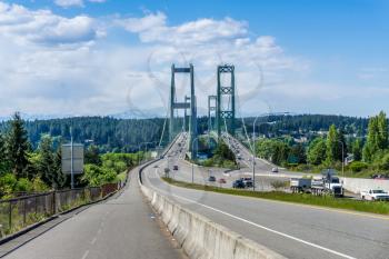 Two suspension bridges known as the Narrows Bridge in Tacoma, Washington.