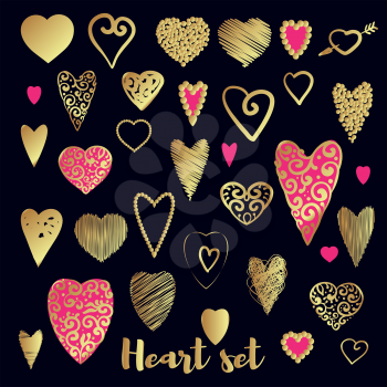 Set of gold and pink ornate heart on a black background