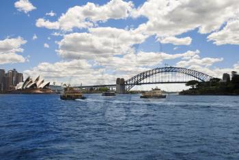 Opera house & Harbour bridge with boat Sydney Australia