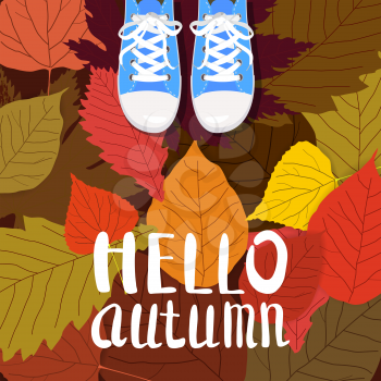 Hello autumn color illustration. Person feet standing in sneakers on yellow, red, green fallen leaves. Hand drawn lettering.