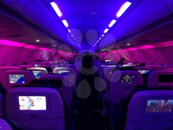 Airplane interior horizontal with video monitor and blue