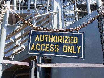 Authorized access only notice sign restricted entry on USS Iowa naval warship destroyer battleship