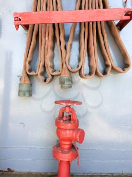 Fire hose hyrdrant red prevention equipment on USS Iowa naval warship destroyer battleship