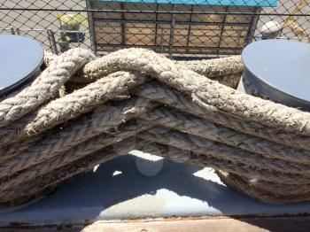 Rope large braided mooring line for ships boat background element on USS Iowa naval warship destroyer battleship