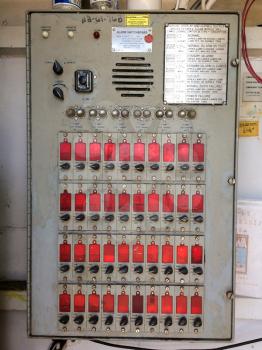 Red emergency switch and button urgent concept on USS Iowa naval warship destroyer battleship