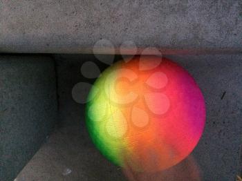 Modern art rainbow sphere geometric shapes in space on gray concrete
