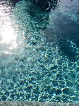 modern swimming pool design aqua blue water sine waves reflections