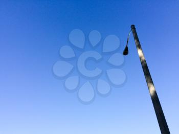electric light pole concept background blue sky sunny day