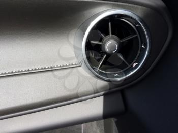 Auto design air vent heat conditioning on dashboard close up